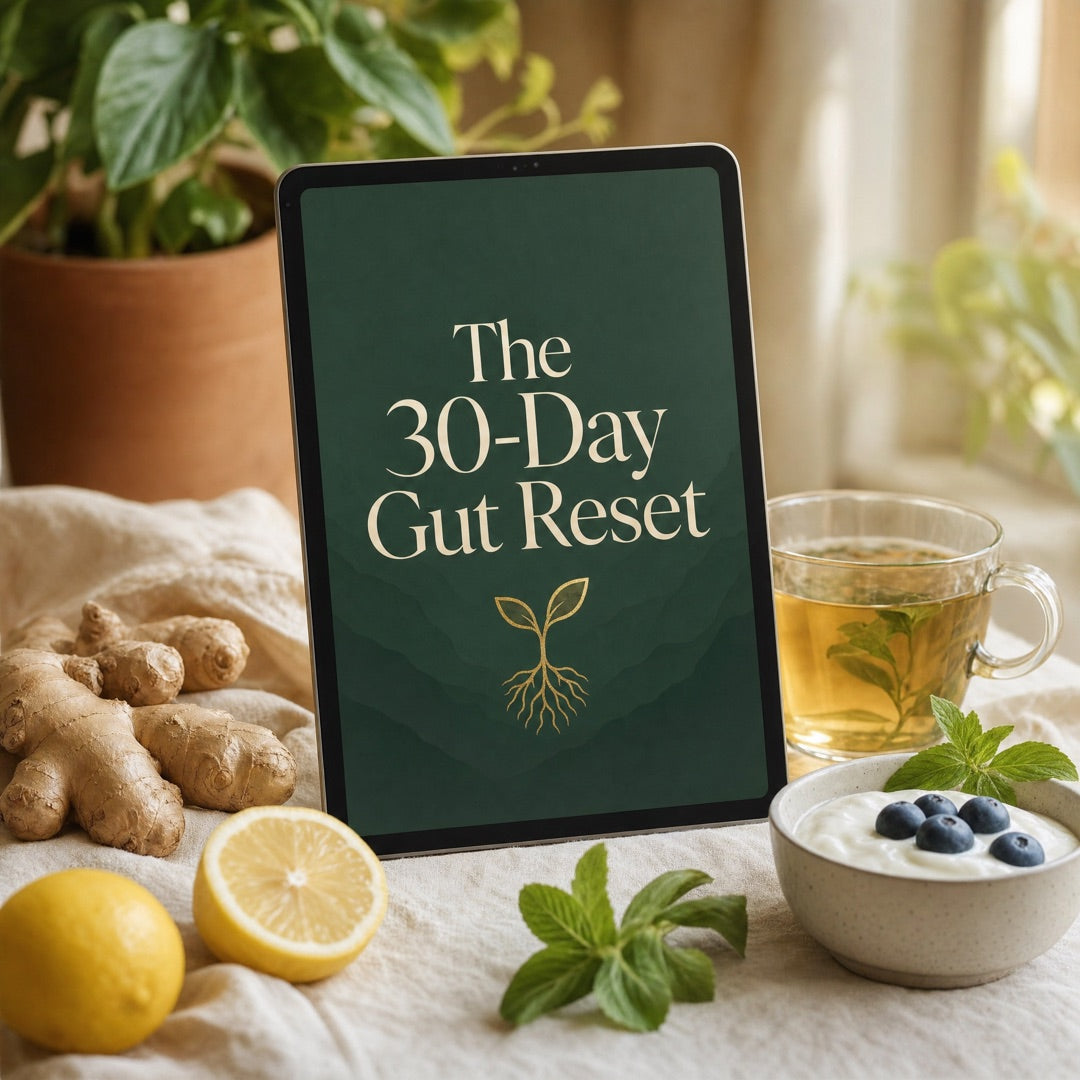 The 30-Day Gut Reset shown on a tablet beside ginger, lemon and herbal tea